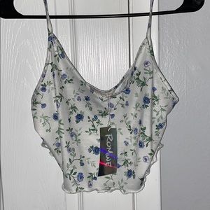 White cropped tank top with a floral pattern